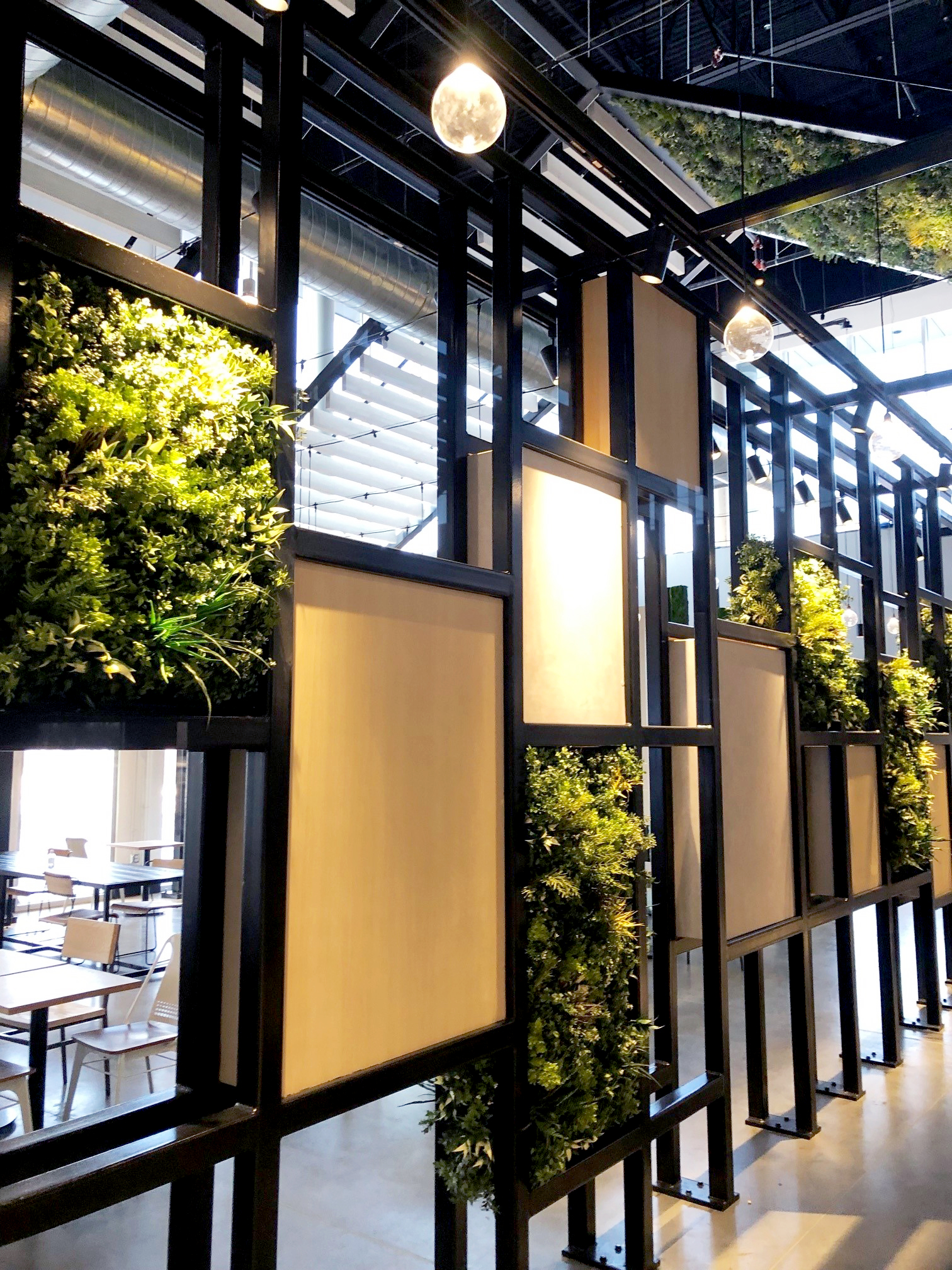 Restaurant with an artificial living wall